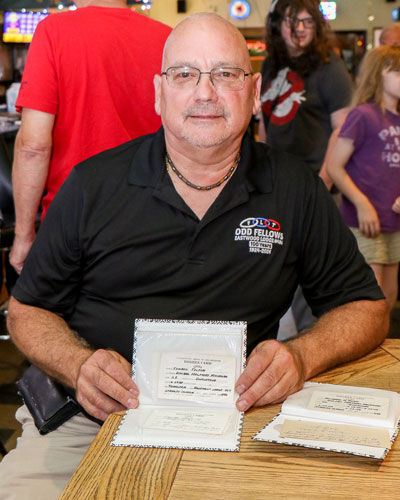  Greg Schornack found membership cards that are dated June 28, 1924. He displayed them at the party. 