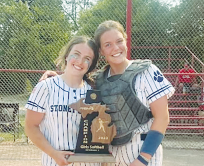  Rochester Hills Stoney Creek seniors Erin Flynn, left, and Christa Munn, right, celebrate a district championship win against Romeo in 2023. 