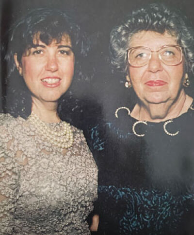  Pam Lippitt and her mother, Sally Lippitt, wear dresses sewn by Sally. Though Sally never had a booth at the Ann Arbor Art Fair, her daughter remembers her as an “artisan” when it came to sewing. 