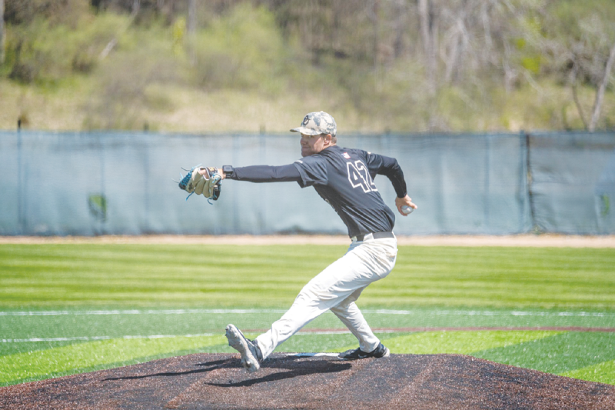  Oakland University right-handed pitcher Brandon Decker throws a pitch during a game. Decker was selected in the 19th round by the New York Yankees. 