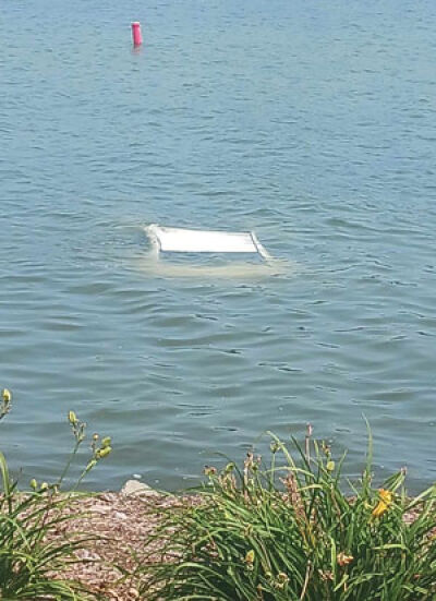  The submerged vehicle can be seen in Lake St. Clair. 