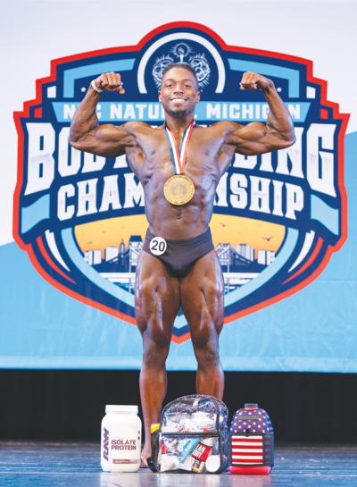  Royal Oak resident and Sterling Heights Stevenson graduate David Clark is all smiles  after winning the NPC Natural Michigan State Championships June 15 in Ypsilanti. 