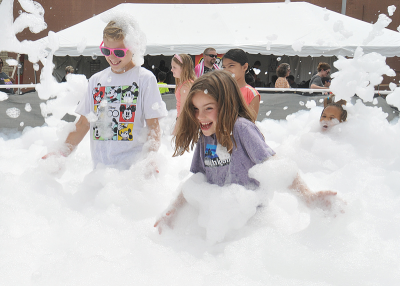  This year’s Farmington Founders Festival coincided with the city’s bicentennial. Part of the fun for children included playing in a pool of bubbles. 