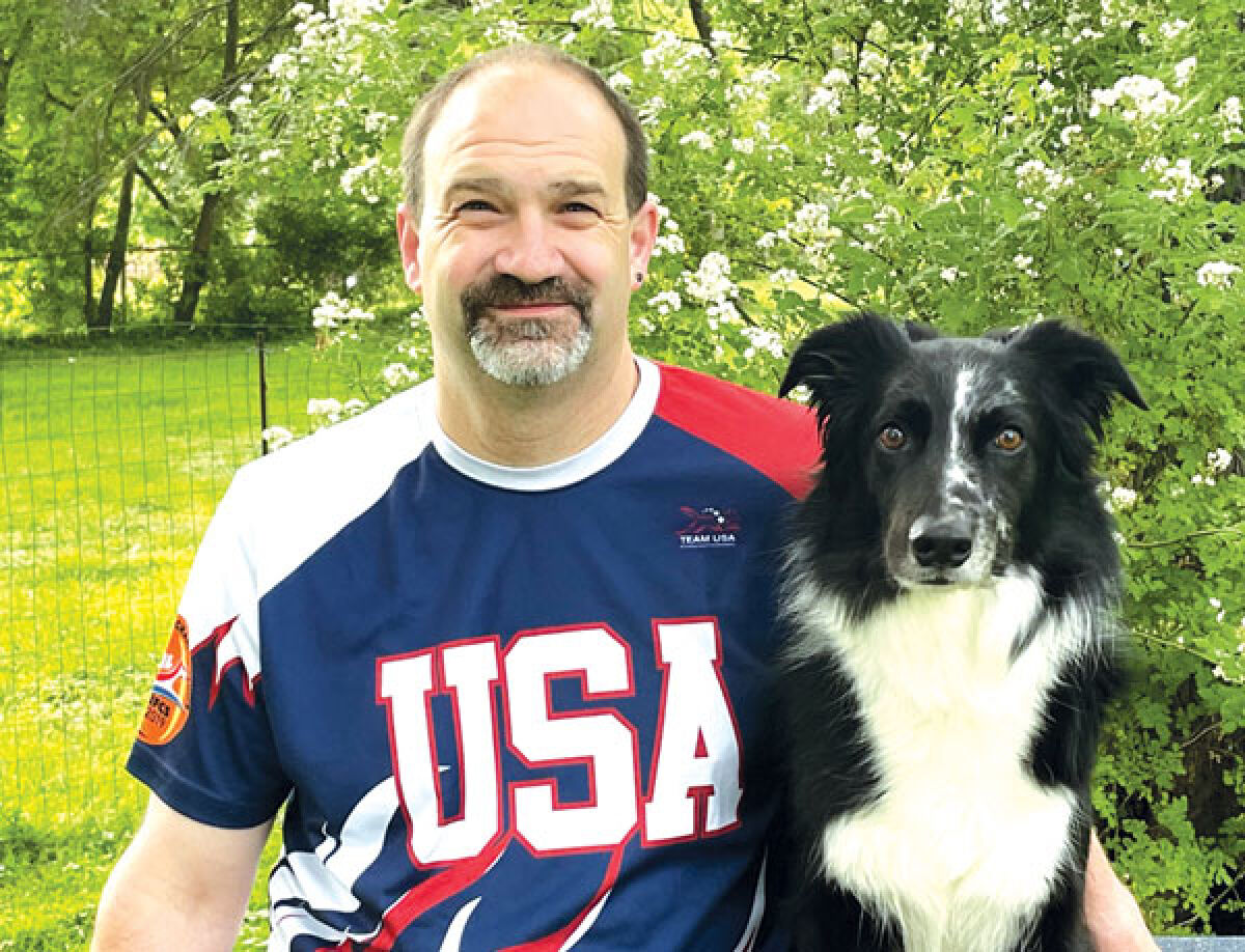  Jeremy Gerhard with his Australian shepherd, Ruckus. 