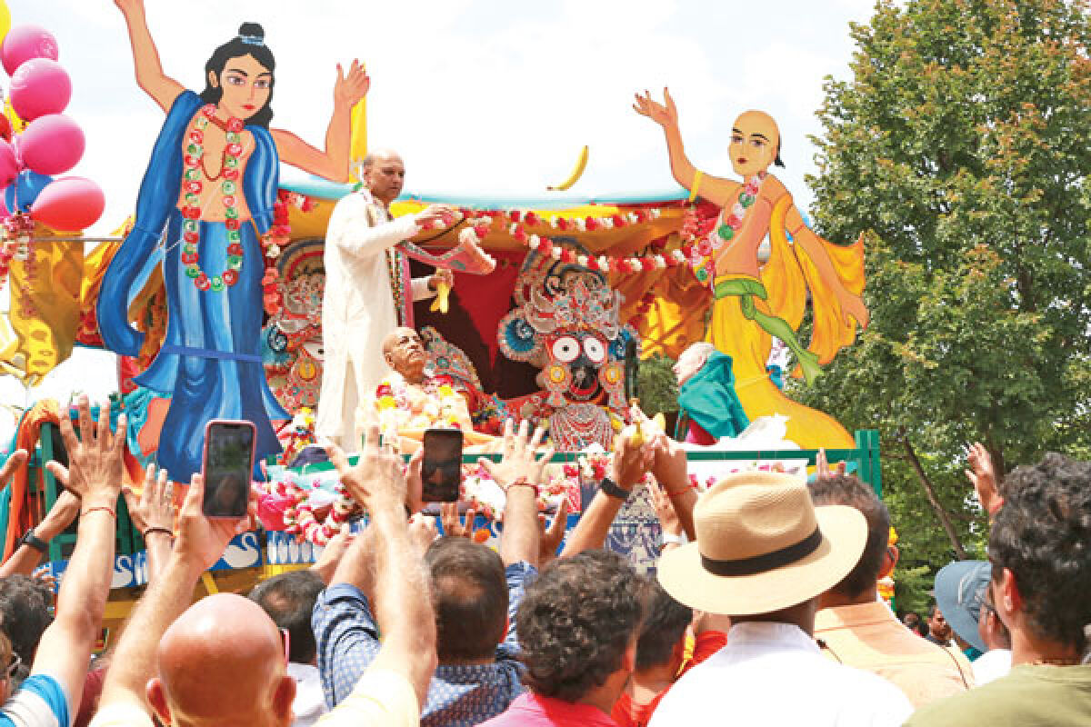  Attendees celebrate the Festival of Chariots in Novi July 21. 