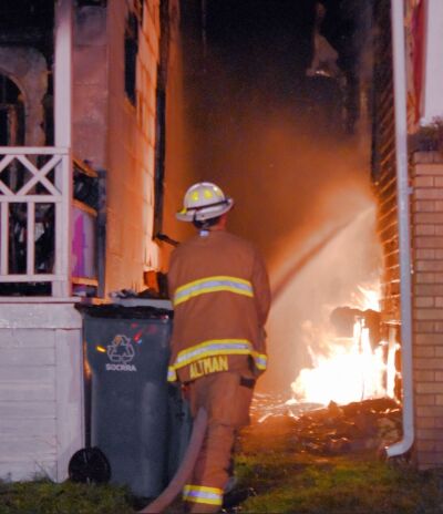  Firefighters from Hazel Park, Madison Heights and Ferndale worked to contain the blaze, which was fueled by a burning gas meter between the two homes.  