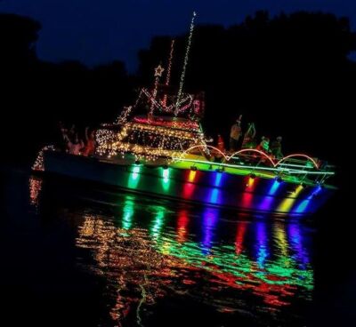  An illuminated boat sails on the Clinton River during a past edition of the Harrison Township Parade of Lights. 