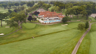  This aerial view shows the Detroit Golf Club clubhouse and course. 