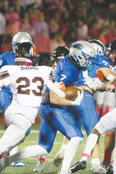  Utica Eisenhower senior Conner Temple runs through the Utica defense. 