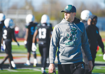  West Bloomfield head coach Zach Hilbers looks on before a game last year. 