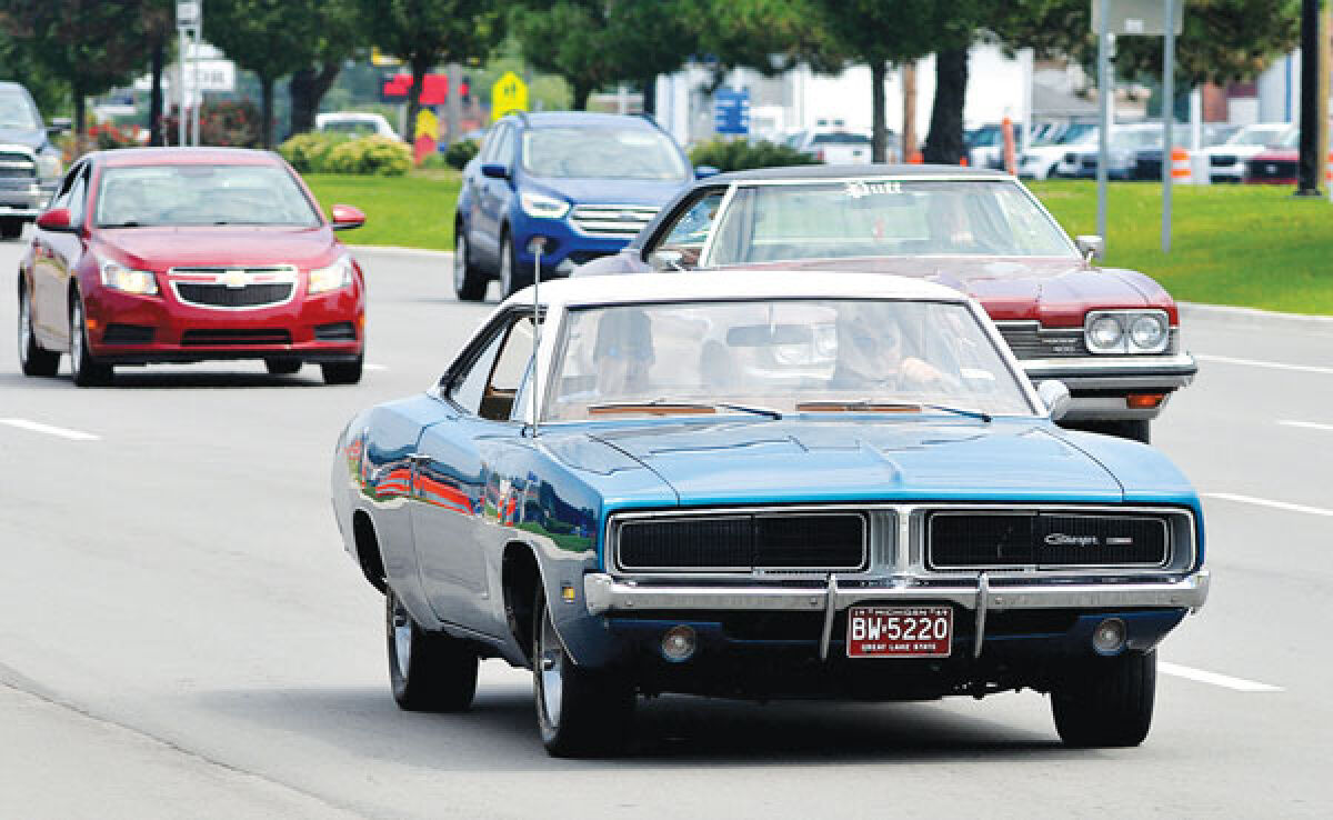  Classic cars roll down Gratiot Aug. 4 for the Clinton Township Gratiot Cruise’s 21st year. 