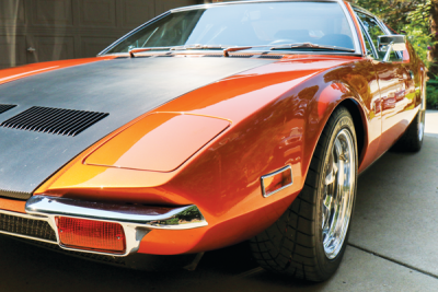  The 1972 DeTomaso Pantera is painted mandarin copper metallic.  