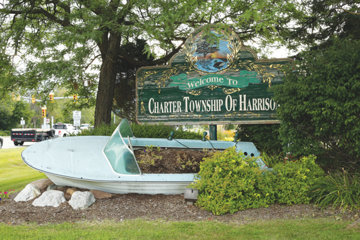  A wooden sign and boat-shaped planter welcome people into Harrison Township along Metro Parkway. The major thoroughfare is one of the many aspects touched on in the township’s yet-to-be-approved 2040 master plan.  