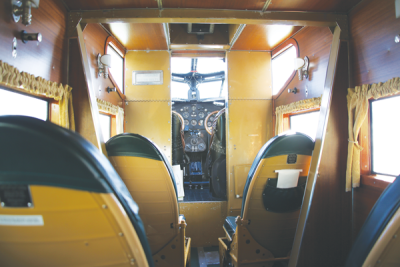   The interior of a 1928 Ford Tri-Motor aircraft reflects the need to impress passengers. In an era when flying had a rough reputation thanks to dogfighters and barnstormers, the Tri-Motor was trimmed out like a contemporary luxury train carriage. 