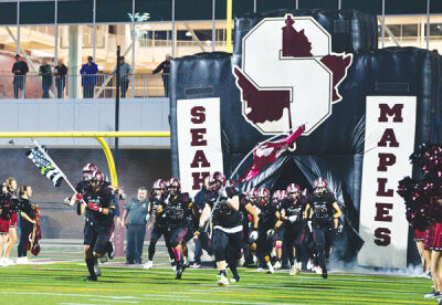  Birmingham Seaholm storms onto the field during a game last season. 