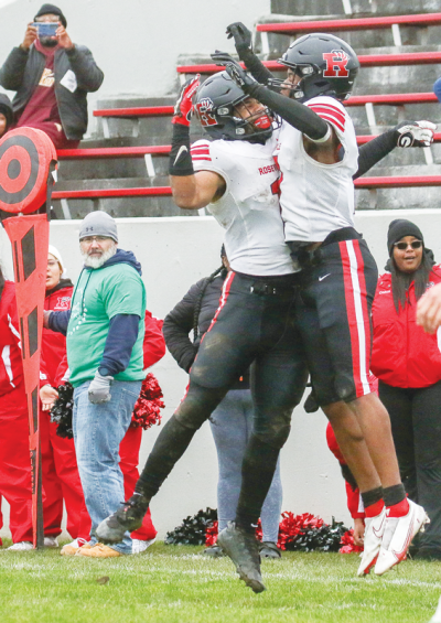  Roseville players celebrate a touchdown last season. 