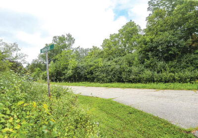  The offer for the House-in-the-Woods property — seen here on the right side of Morningside Drive — was $100,000 cash. 