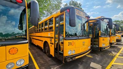  Troy School District buses await the beginning of the school year on Aug. 12. 