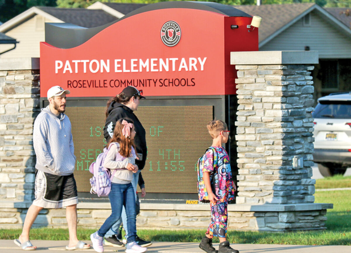  Students arrive at Patton Elementary School in Roseville on the first day of school Sept. 4. 