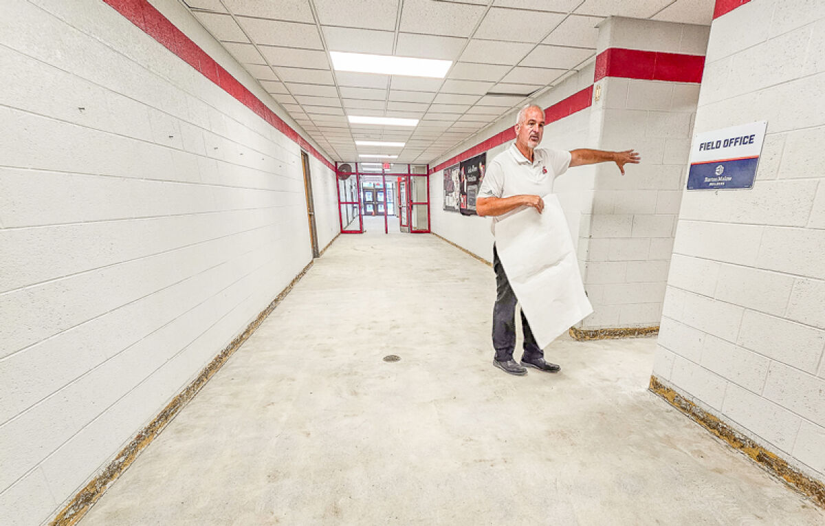  Lake Shore Schools Superintendent Joseph DiPonio stands in one of the hallways in Rodgers Elementary School. 