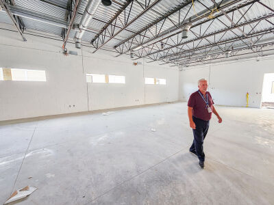  Lakeview Public Schools Superintendent Karl Paulson stands in one of the high ceiling rooms at Lakeview High School. 