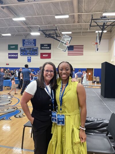  Class of 1982 inductee Lisa Rotondo stands with Class of 2023 inductee Aubrey Wilson, who broke Rotondo’s longstanding 70-meter dash record. 