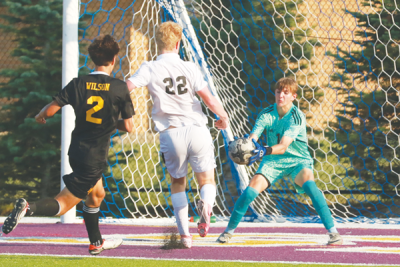  Warren De La Salle sophomore goalkeeper Dominic Baldarotta makes a save during a 3-1 win against Bloomfield Hills Brother Rice on Sept. 13 at De La Salle High School. 