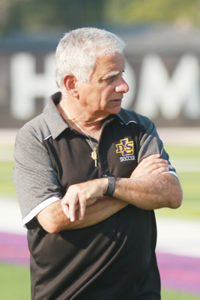  Warren De La Salle head coach Thaier Mukhtar looks on during a matchup against Bloomfield Hills Brother Rice on Sept. 13 at De La Salle High School. 