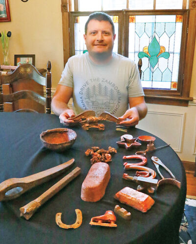  Steve Mouton collects mining items such as things made out of copper as well as rocks and sand from beaches. He is knowledgeable about the history behind “Copper Country.” 