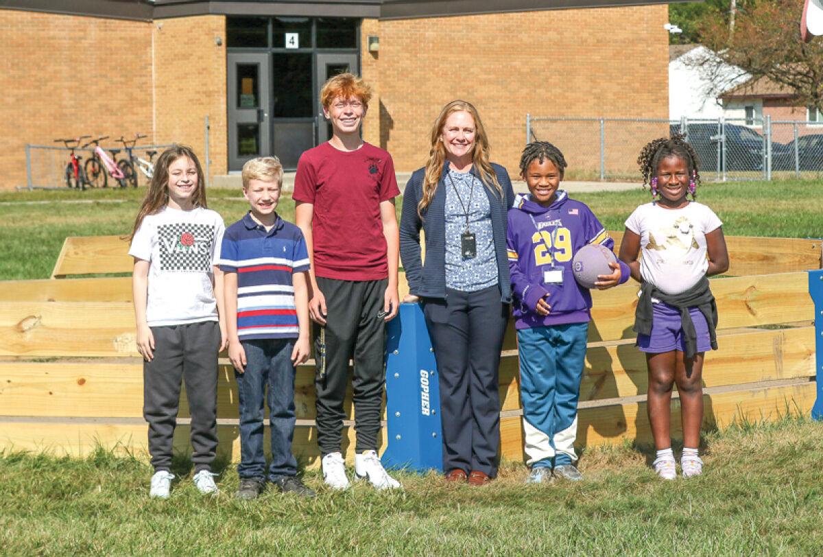  Roseville High School junior Lucas Sides, third from left, made a gaga pit for the students at Kaiser Elementary School as his Eagle Scout project. Pictured with him and Kaiser Elementary School Principal Kelly Grider are fourth grade students, from left, Gracie Farley, Carsyn Eaton, Jason Walker, and Aubrie Ballard. 