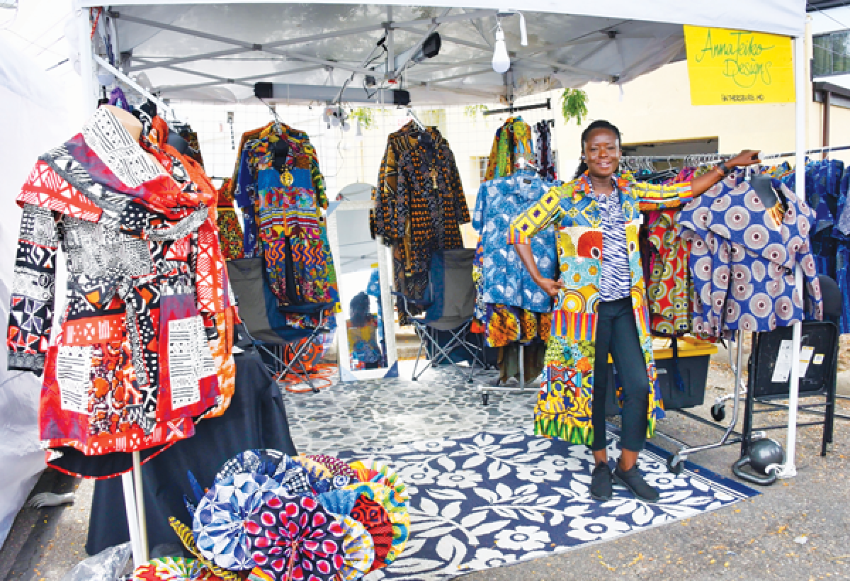  Anna Teiko displays her clothing from AnnaTeiko Designs at the DIY Street Fair Sept. 21.  