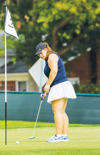  Grosse Pointe South senior Tenley Stiyer putts  during a matchup against Sterling Heights Stevenson Sept. 20 at Lochmoor Club.  