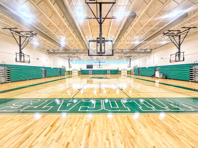  The new gym has stadium seating for up to 1,200 people and allows for the entire student body to have assemblies together. 