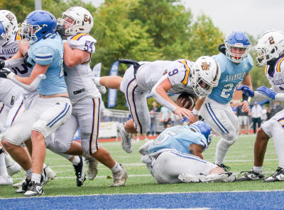  Warren De La Salle junior Anthony Bitonti takes it himself for a touchdown during a matchup against Detroit Catholic Central Sept. 29 at Catholic Central High School. 