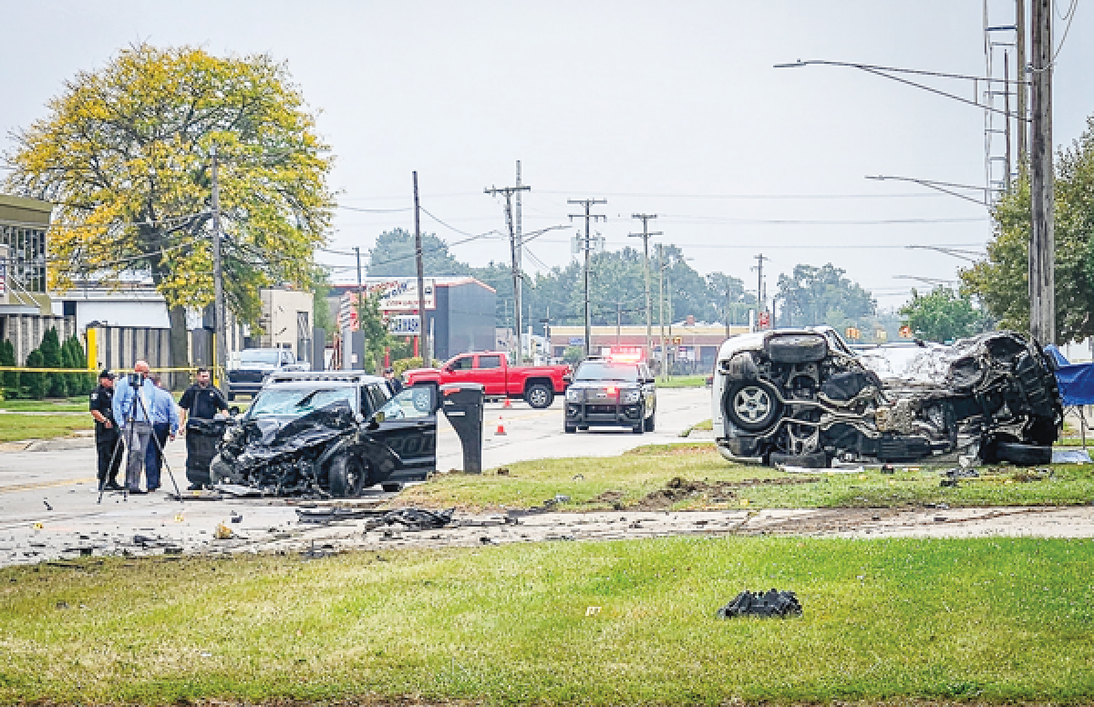  Two Warren police officers in a marked patrol car were going southbound on Schoenherr Road toward Prospect Avenue when they were involved in a crash with a white Dodge Durango at approximately 5 a.m. on Sept. 30. 