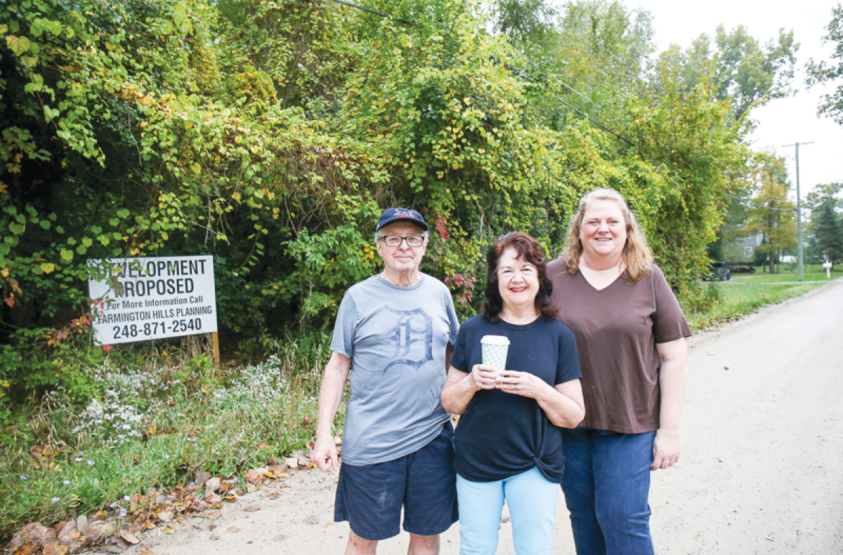  A proposal for a development on the south side of Folsom Road, between Parker Avenue and Lundy Drive, has been a cause for concern for some residents in the area. Pictured are local residents Tom and Barb Seabolt, and Michelle Gala. 