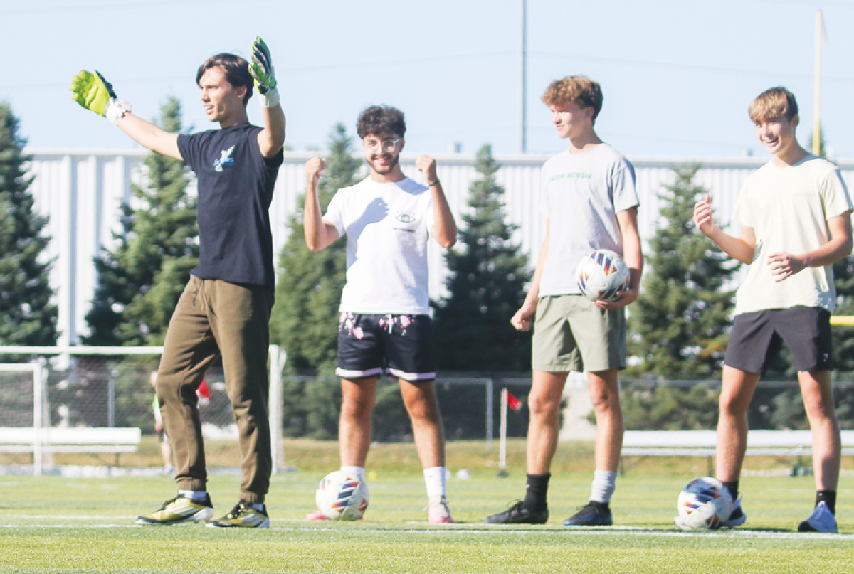  Bloomfield Hills Roeper senior goalkeeper Hollis Perry, far left, and the rest of the team work on penalty kick drills during a team practice Oct. 2 at the UWM Sports Complex in Pontiac. 