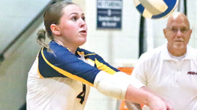  Fraser junior libero Samantha Smith gets under the ball. 