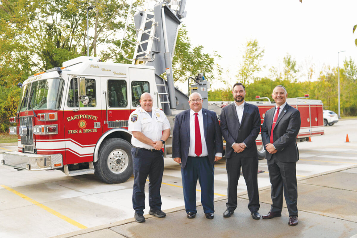  The Eastpointe Fire Department recently donated its 1998 aerial ladder firetruck to the Macomb Community College Public Service Institute for training purposes. Pictured from left is Eastpointe Fire Chief Brian Marquardt, Macomb Community College President James O. Sawyer IV, Eastpointe Mayor Mike Klinefelt and Director of the Macomb Community College Public Service Institute Mike Lopez. 