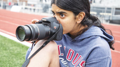  Troy High School senior Meera Iyer covers sporting events for Troy schools as a part of the Creative Guild. 