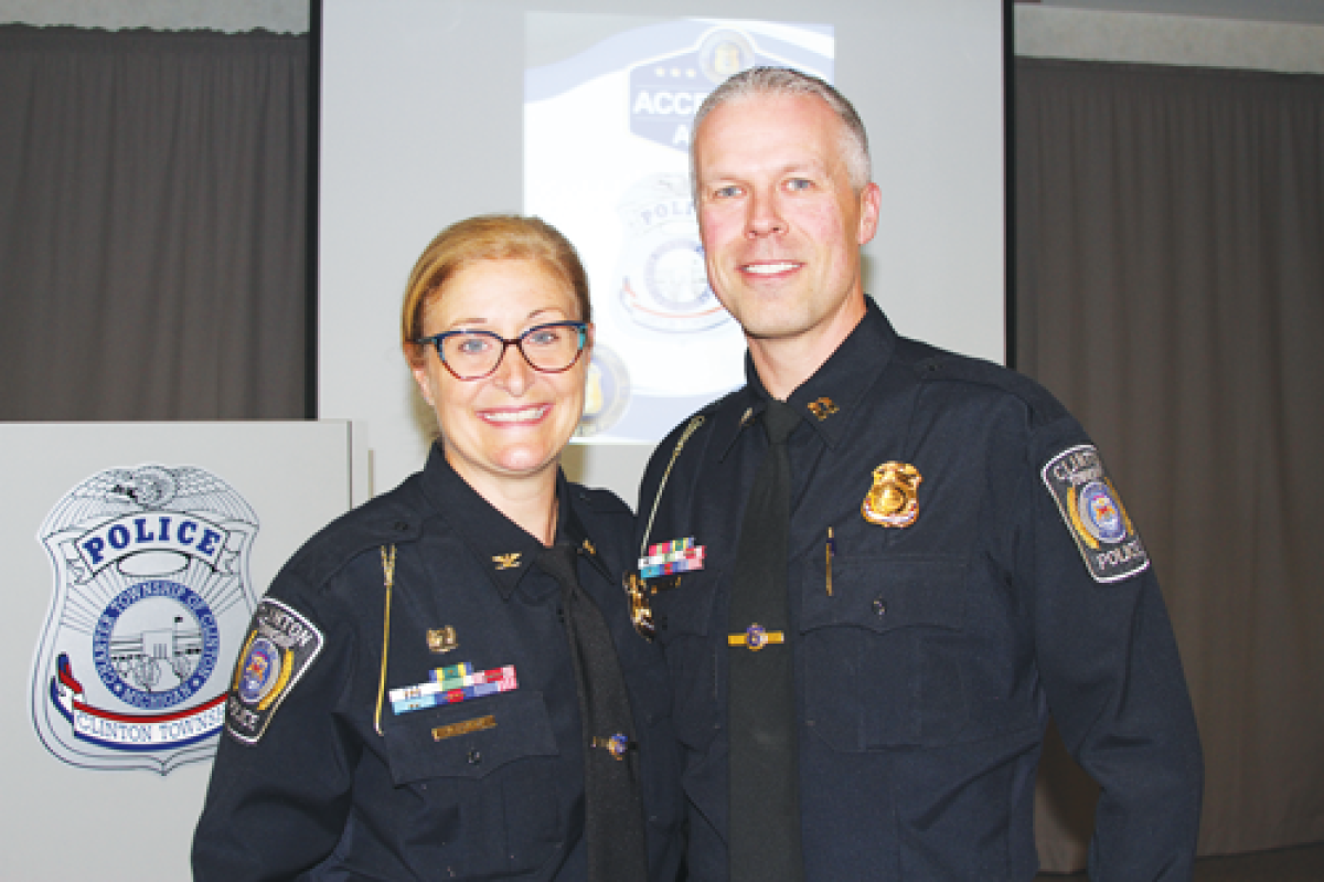  Current Clinton Township Police Chief Dina Caringi, left, poses for a picture with Clinton Township Police Capt. Preston Susalla. Susalla will take over as chief of the department next June. 