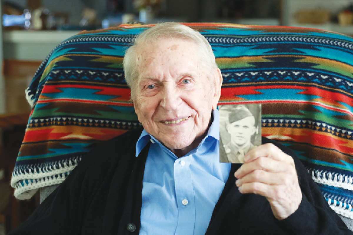  Richard Aurand, holding up a photo of himself in World War II, will turn 100 years old Oct. 19. Aurand never expected to turn 100 years old. “I never thought about it,” he said. “Part of it is keeping a good attitude. I eat properly. Make sure everything is good instead of bad.” 