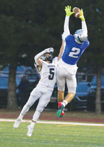  Utica Eisenhower junior wideout Keaton Duda makes a leaping grab. 