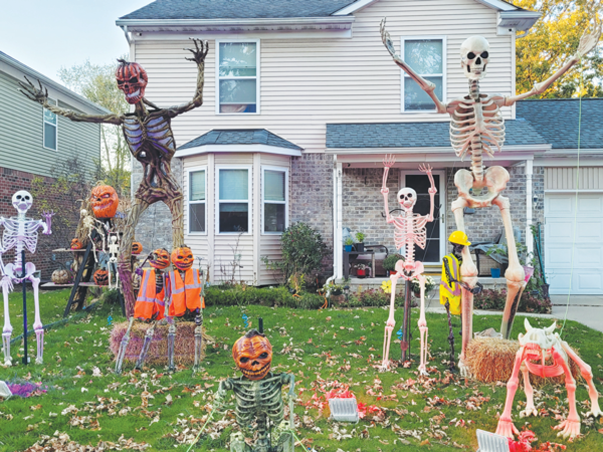  Known as  the Skeleton House in Madison Heights, Holly Hayter displays skeletons all year  by changing the props and the outfits they wear. 