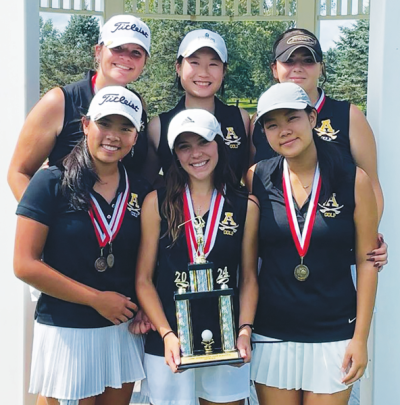  Rochester Adams celebrates after becoming Judson Scramble champions. 