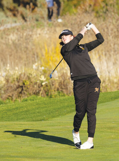  Mercy senior Maeve Casey follows through on a shot. 