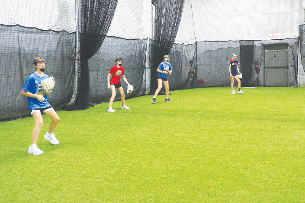  Advanced Sports Performance, a newly opened softball facility, holds a team practice for the 13U Michigan Batbusters travel softball team Oct. 10.  