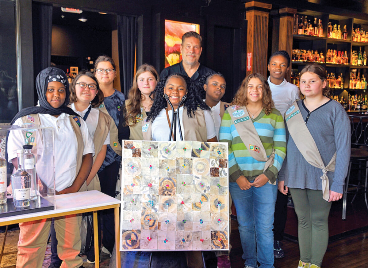  Girl Scouts of Southeastern Michigan in the Girls Empowerment Program worked with artist Amanda Koss to create this piece using food waste. The artwork was purchased for $150 by Chef Johnny Prepolec, owner of the restaurant Alchemi in Royal Oak.  