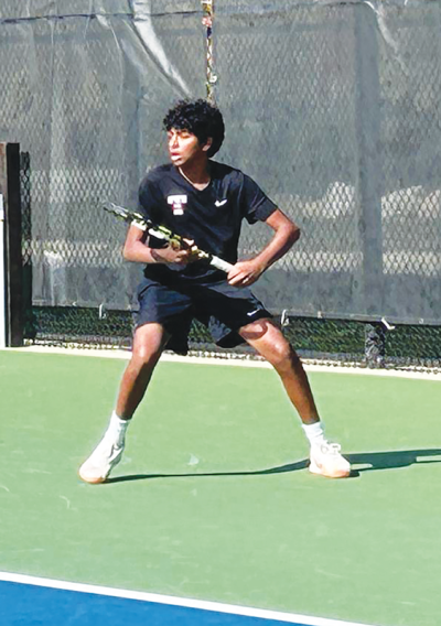  Troy freshman Dheeraj Yelleti readies to hit the ball. 