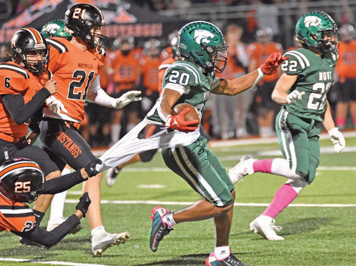  Community School District The Novi Wildcats play against their arch rival, the Northville Mustangs, at Northville on Oct. 18. The close game resulted in a Northville victory, 27-25. 